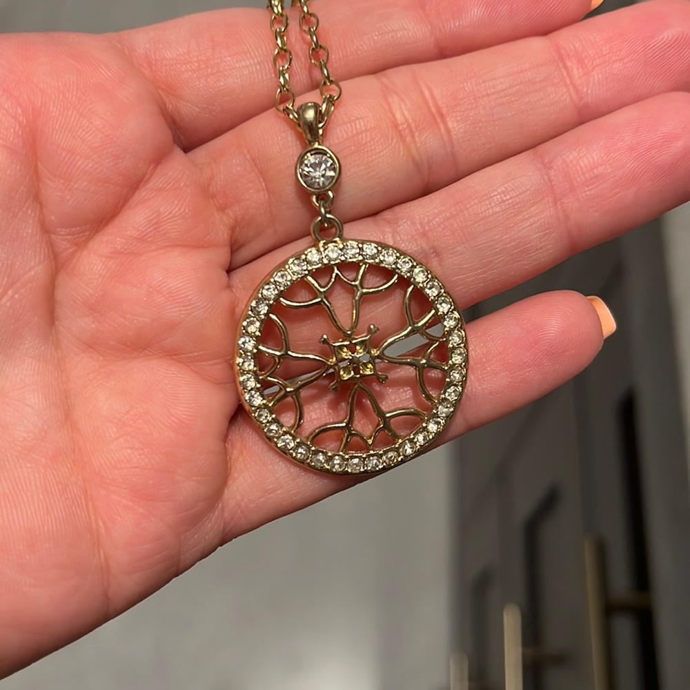 Gold color necklace and circle pendant
